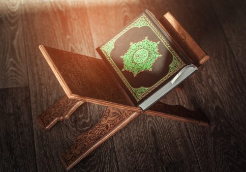 the-holy-book-of-the-koran-on-the-stand-2021-12-22-18-48-18-utc-min.jpg